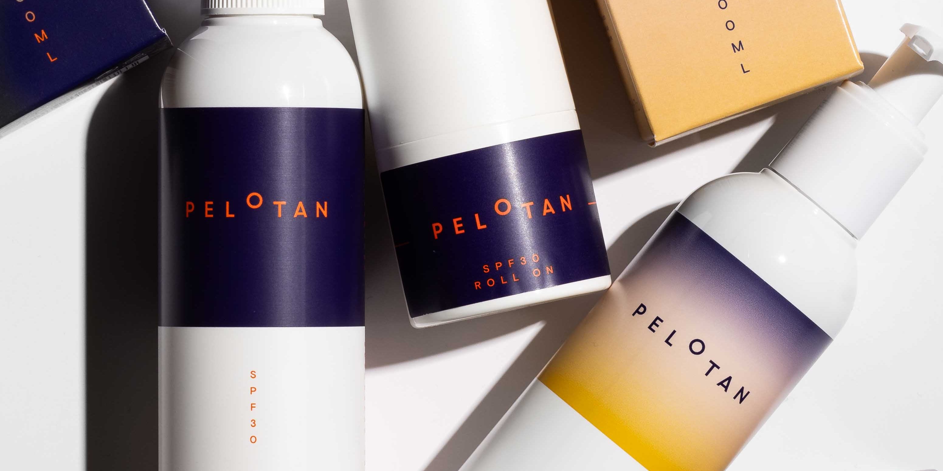 Three bottles that make up the Ultimate Protect and Recover Bundle (Spray, Roll-on and Après Recovery) are flat-laid on a white background.